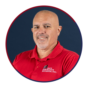 Ross Rice, founder of Rice Insurance Benefits, wearing his company polo